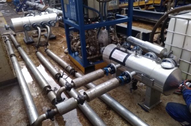 Steam manifolds and insulated pipework for steam exchanger